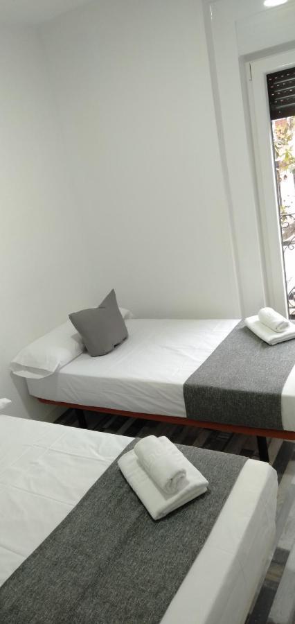 Habitación Doble con baño compartido - 2 camas